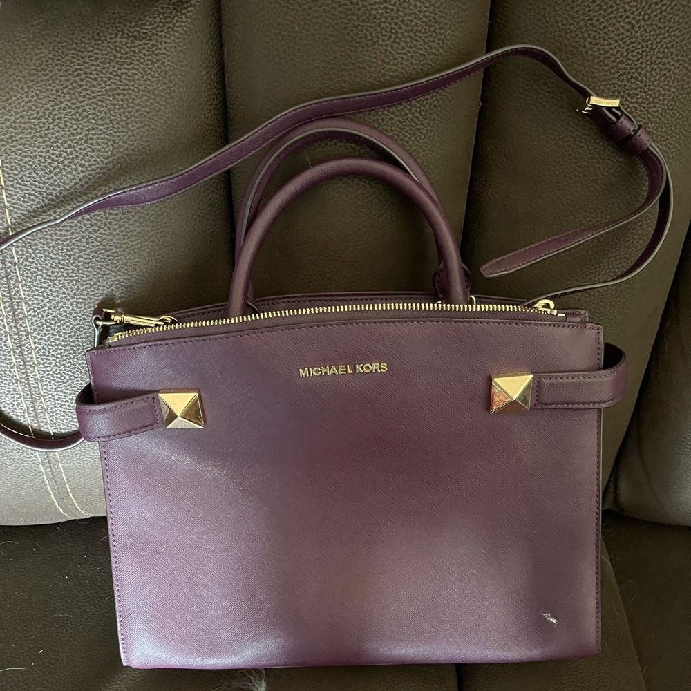 Plum coloured purse.
